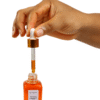 Hand dispensing Fade Face Oil serum with glass pipette dropper