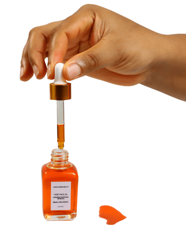 Hand dispensing Fade Face Oil serum with glass pipette dropper