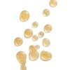 Hydrating golden facial serum swatches and liquid droplets of Marula Green Beauty Complexion Tonic Serum