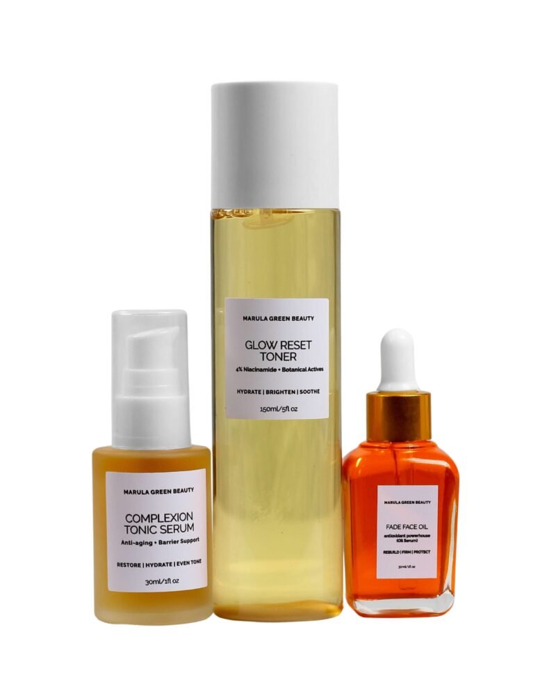 Marula Green Beauty skincare trio including Glow Reset Toner, Complexion Tonic Serum, and Fade Face Oil lined up side-by-side on a clean white surface with minimal drop shadows.