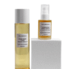 Marula Green Beauty Glow Reset Duo — Glow Reset Toner (150ml) standing beside the Complexion Tonic Serum (30ml), which sits elevated on a white pedestal against a clean white background.